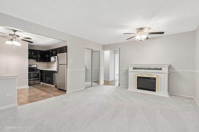5340 Waterbury Ct Unit 2103, Crestwood, IL 60418 - unfurnished living room with a ceiling fan, light colored carpet, and a fireplace