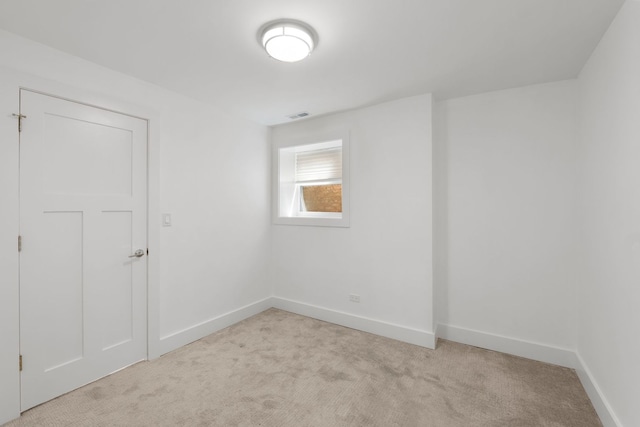 5312 S Woodlawn Ave Unit 1, Chicago, IL 60615 - unfurnished room featuring light carpet