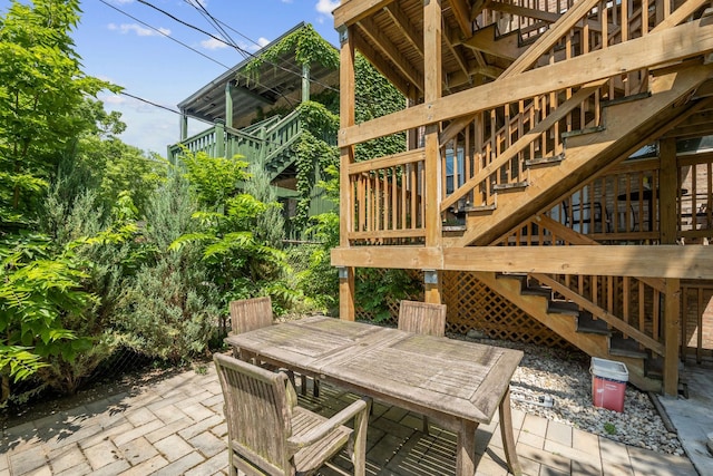 5312 S Woodlawn Ave Unit 1, Chicago, IL 60615 - view of patio / terrace with stairs and outdoor dining space
