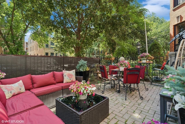 2848 N Burling St Unit 1, Chicago, IL 60657 - view of patio featuring an outdoor living space and outdoor dining area