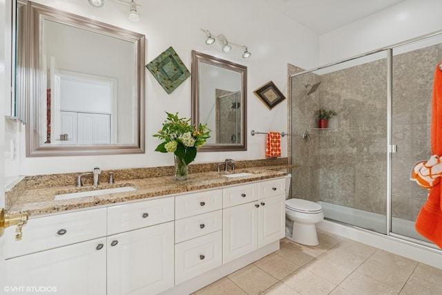 2848 N Burling St Unit 1, Chicago, IL 60657 - full bath featuring tile patterned floors, a shower stall, and double vanity