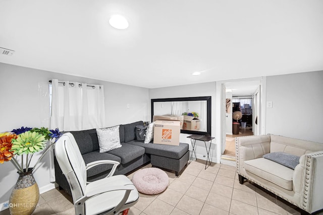 2924 N Mulligan Ave, Chicago, IL 60634 - living area featuring light tile patterned flooring and baseboards