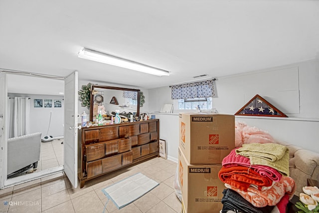 2924 N Mulligan Ave, Chicago, IL 60634 - below grade area featuring light tile patterned floors
