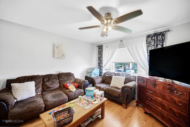 2924 N Mulligan Ave, Chicago, IL 60634 - living room with ceiling fan and light wood-style floors