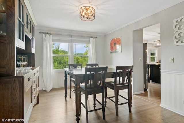 904 Warwick Ln, Lake Zurich, IL 60047 - dining space featuring a chandelier, light wood-style floors, and crown molding