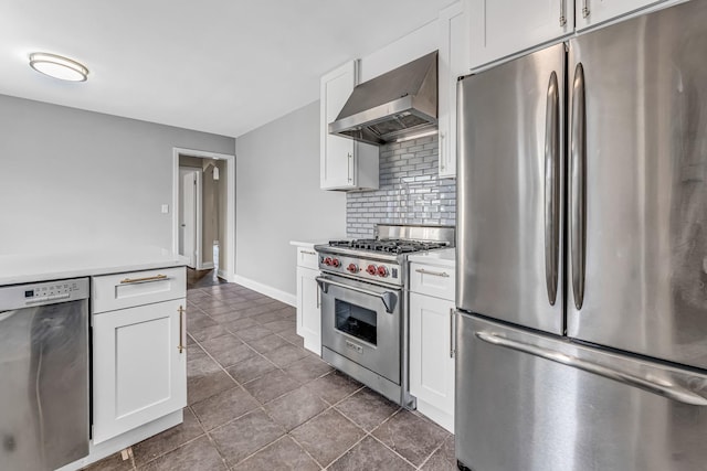 10026 S Spaulding Ave, Evergreen Park, IL 60805 - kitchen featuring appliances with stainless steel finishes, wall chimney range hood, decorative backsplash, and light countertops