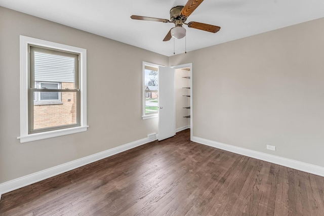 10026 S Spaulding Ave, Evergreen Park, IL 60805 - spare room with wood finished floors and a ceiling fan