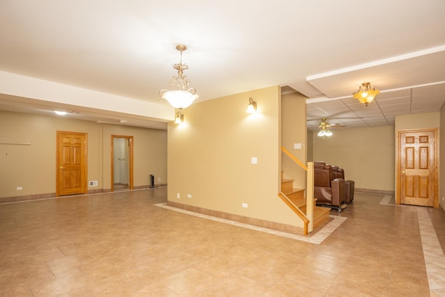 115 E Woodlawn Rd, New Lenox, IL 60451 - empty room with stairs and a ceiling fan