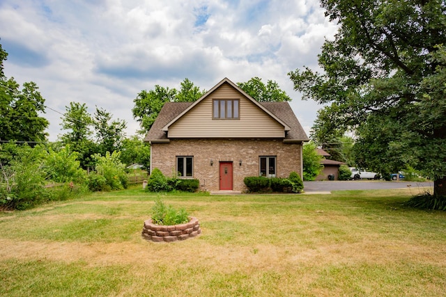 115 E Woodlawn Rd, New Lenox, IL 60451 - traditional-style house with brick siding, a front yard, and a shingled roof