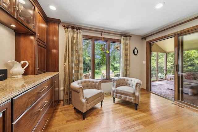 11522 Ridgewood Ln, Burr Ridge, IL 60527 - living area featuring healthy amount of natural light, light wood-style floors, and recessed lighting