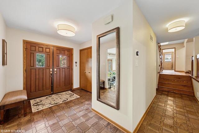 11522 Ridgewood Ln, Burr Ridge, IL 60527 - foyer entrance with baseboards and stairs