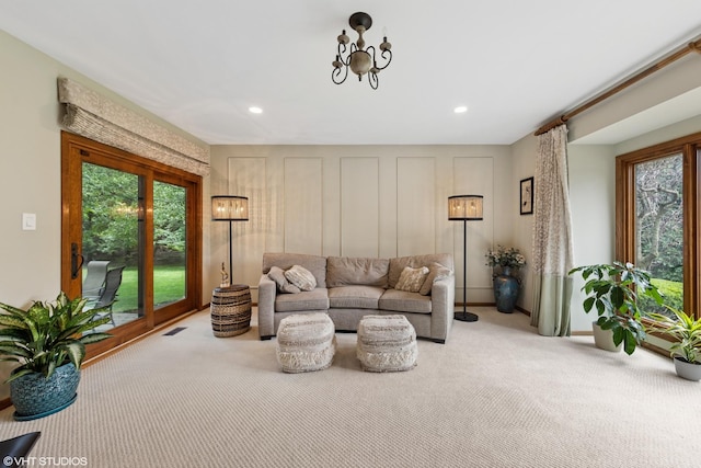 11522 Ridgewood Ln, Burr Ridge, IL 60527 - living room with carpet, recessed lighting, and a chandelier