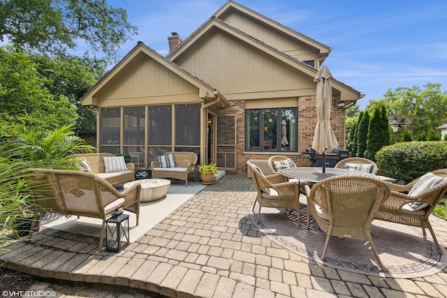 11522 Ridgewood Ln, Burr Ridge, IL 60527 - view of patio featuring a sunroom and outdoor dining space
