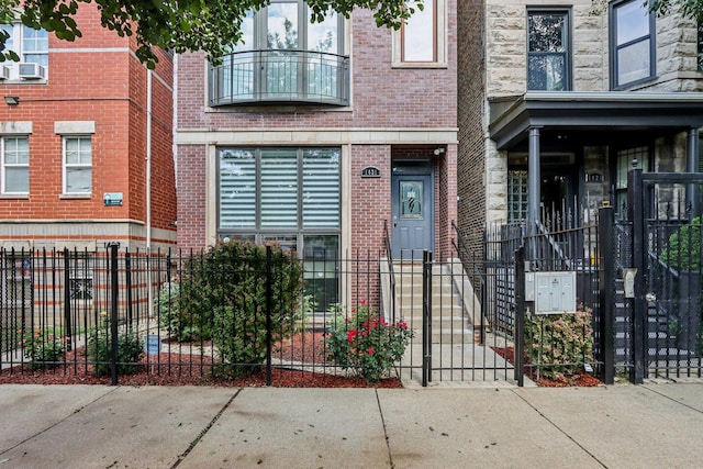1431 N Artesian Ave Unit 1, Chicago, IL 60622 - entrance to property with brick siding and cooling unit