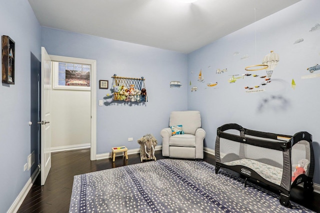 1431 N Artesian Ave Unit 1, Chicago, IL 60622 - bedroom featuring baseboards and wood finished floors