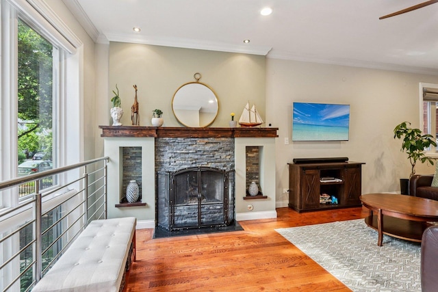1431 N Artesian Ave Unit 1, Chicago, IL 60622 - living area with wood finished floors, crown molding, a fireplace, recessed lighting, and a ceiling fan