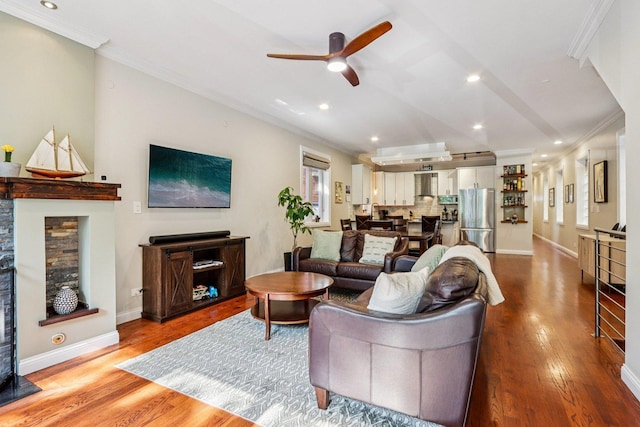 1431 N Artesian Ave Unit 1, Chicago, IL 60622 - living area featuring crown molding, ceiling fan, wood finished floors, recessed lighting, and a stone fireplace