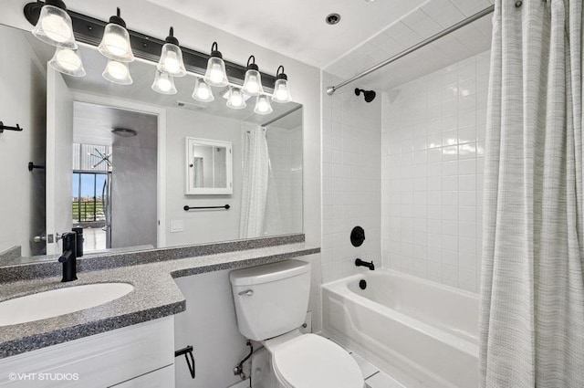 2614 N Clybourn Ave Unit 311, Chicago, IL 60614 - bathroom featuring shower / bath combo with shower curtain and vanity