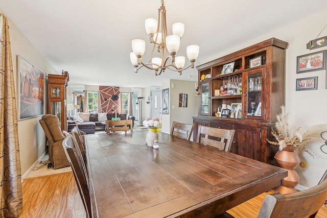 1192 Sumac Trl, Hoffman Estates, IL 60192 - dining room with a chandelier and wood finished floors
