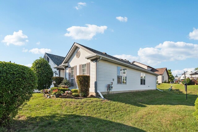 1192 Sumac Trl, Hoffman Estates, IL 60192 - view of home's exterior with a lawn