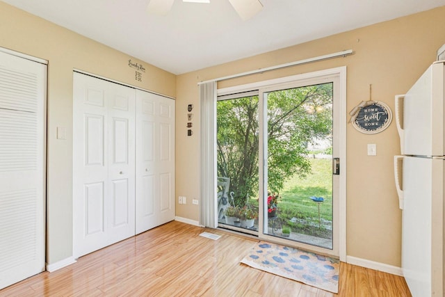 1192 Sumac Trl, Hoffman Estates, IL 60192 - doorway to outside featuring light wood-style flooring and ceiling fan
