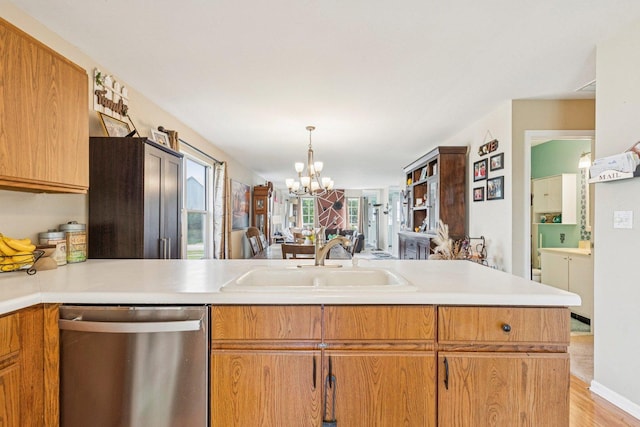 1192 Sumac Trl, Hoffman Estates, IL 60192 - kitchen with dishwasher, a chandelier, open floor plan, light countertops, and light wood-style floors