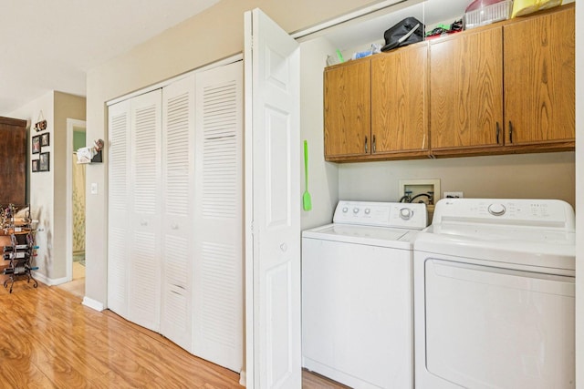 1192 Sumac Trl, Hoffman Estates, IL 60192 - washroom with cabinet space, washer and clothes dryer, and light wood-type flooring