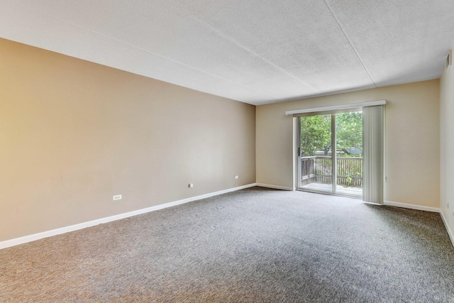 512 Redondo Dr Unit 112, Downers Grove, IL 60516 - carpeted empty room featuring a textured ceiling and baseboards