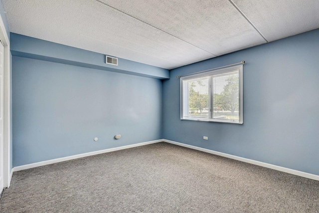 512 Redondo Dr Unit 112, Downers Grove, IL 60516 - carpeted spare room featuring a textured ceiling