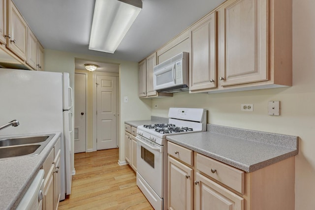 512 Redondo Dr Unit 112, Downers Grove, IL 60516 - kitchen with white appliances, light wood-type flooring, light brown cabinets, and light countertops
