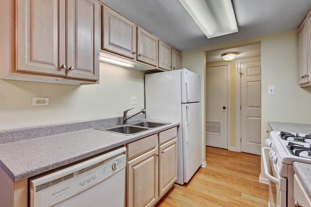 512 Redondo Dr Unit 112, Downers Grove, IL 60516 - kitchen with white appliances, light wood-style floors, light countertops, and light brown cabinets