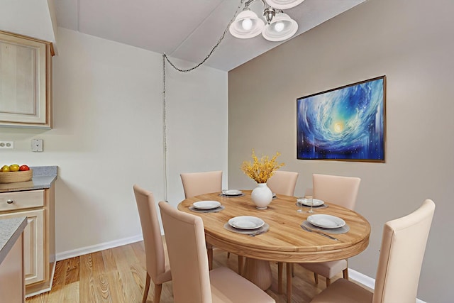 512 Redondo Dr Unit 112, Downers Grove, IL 60516 - dining space featuring baseboards and light wood-style flooring