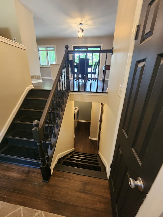814 S 11th Ave, Saint Charles, IL 60174 - staircase with wood finished floors and baseboards