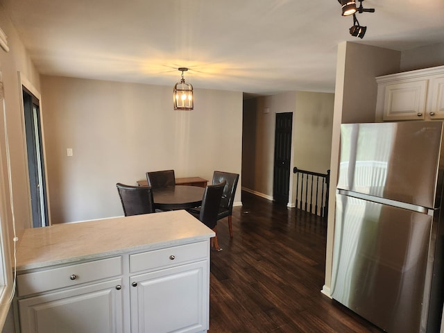 814 S 11th Ave, Saint Charles, IL 60174 - dining area with dark wood-style flooring and baseboards