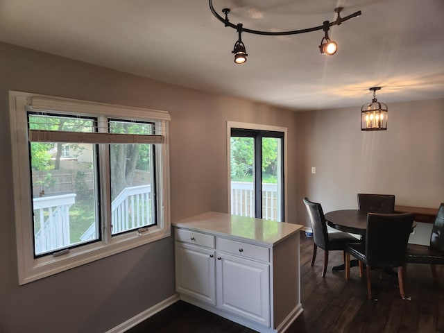 814 S 11th Ave, Saint Charles, IL 60174 - dining area featuring dark wood finished floors and a chandelier