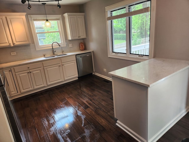 814 S 11th Ave, Saint Charles, IL 60174 - kitchen featuring stainless steel dishwasher, dark wood-style floors, and light countertops