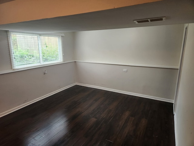 814 S 11th Ave, Saint Charles, IL 60174 - empty room with dark wood finished floors and baseboards