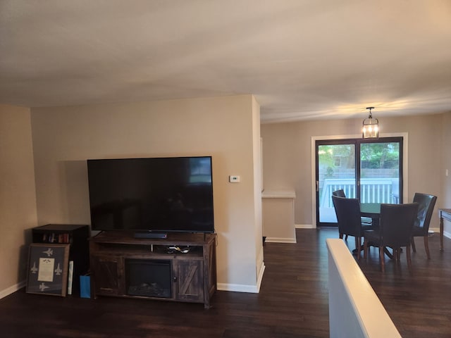 814 S 11th Ave, Saint Charles, IL 60174 - living room with dark wood finished floors and a chandelier