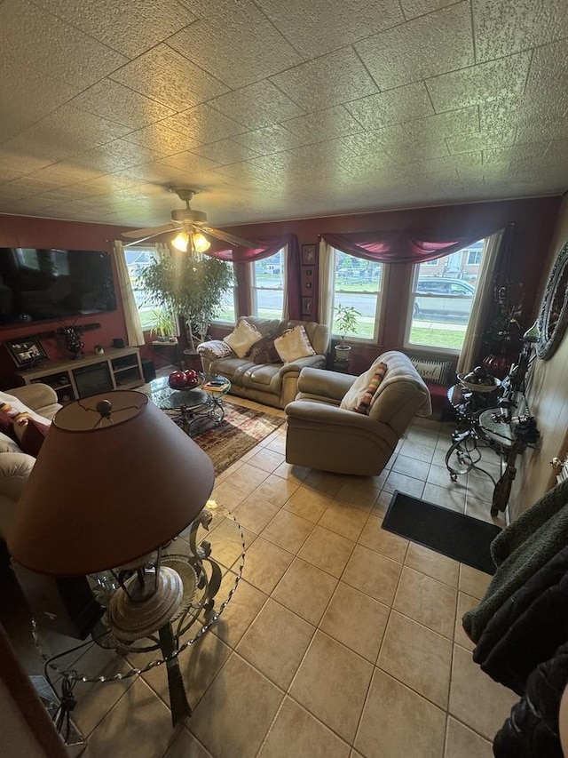 201 S Roy Ave, Northlake, IL 60164 - living area with light tile patterned floors and a ceiling fan