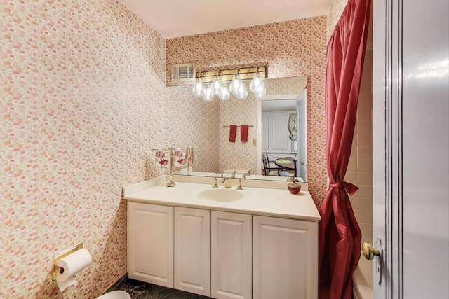 1667 Sunnyside Ave, Highland Park, IL 60035 - full bathroom with wallpapered walls and vanity