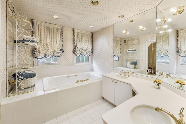 1667 Sunnyside Ave, Highland Park, IL 60035 - bathroom featuring double vanity, a bath, wallpapered walls, and tile patterned floors
