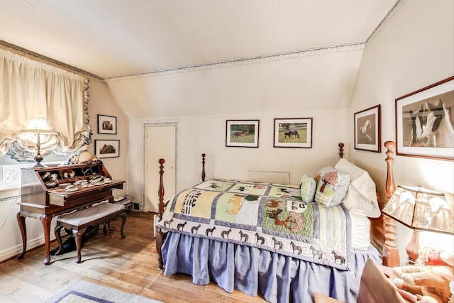 1667 Sunnyside Ave, Highland Park, IL 60035 - bedroom featuring vaulted ceiling and light wood-style flooring
