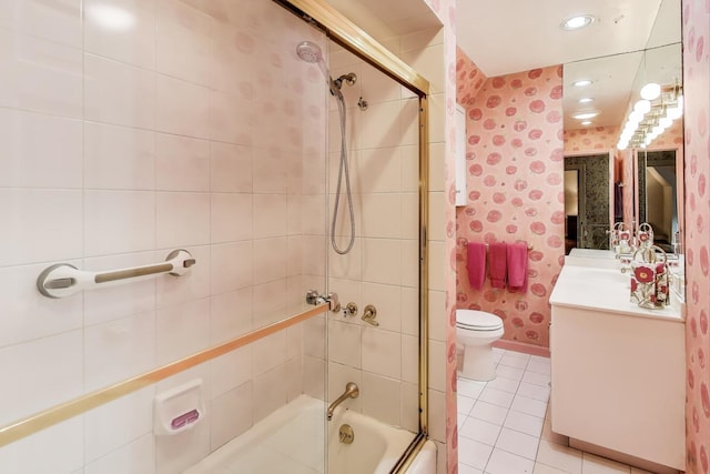 1667 Sunnyside Ave, Highland Park, IL 60035 - full bathroom featuring wallpapered walls, vanity, tile patterned floors, shower / bath combination with glass door, and recessed lighting
