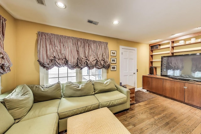 1667 Sunnyside Ave, Highland Park, IL 60035 - living room featuring wood-type flooring and recessed lighting