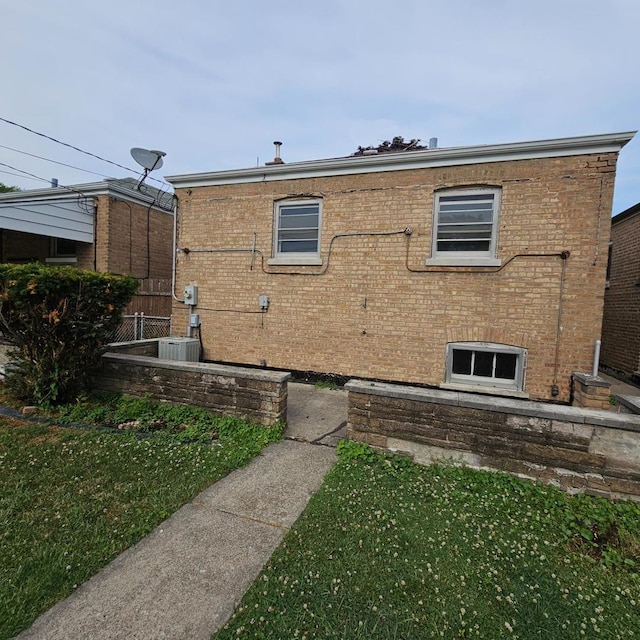 4804 S Lamon Ave, Chicago, IL 60638 - view of side of home with brick siding and a lawn