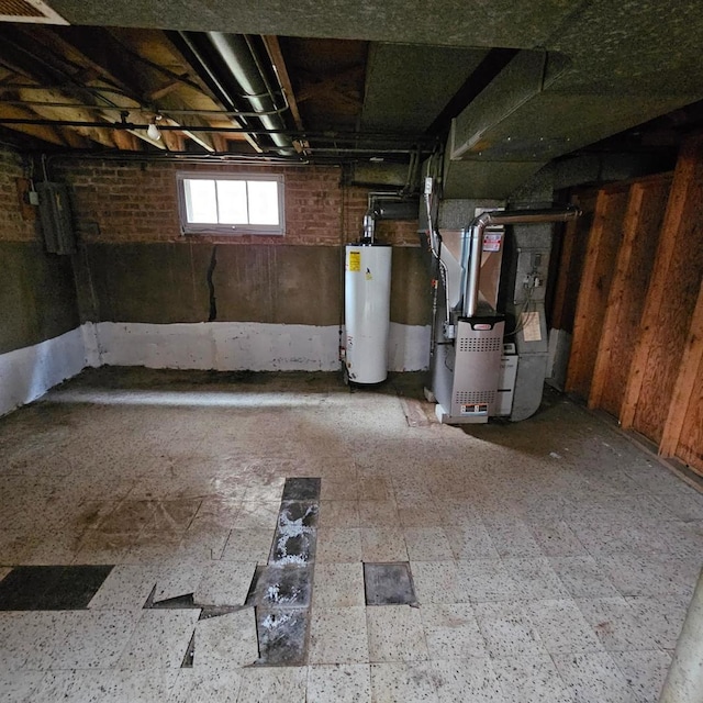 4804 S Lamon Ave, Chicago, IL 60638 - below grade area with gas water heater, heating unit, and tile patterned floors