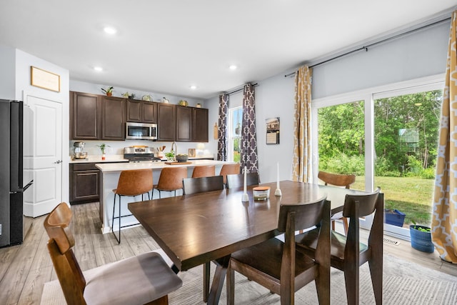 8520 White Oaks Ct, Wonder Lake, IL 60097 - dining space featuring light wood-style floors and recessed lighting