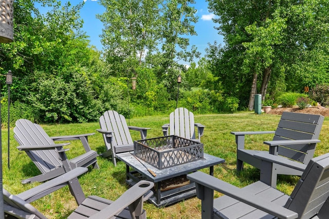 8520 White Oaks Ct, Wonder Lake, IL 60097 - view of green lawn featuring a fire pit and view of wooded area