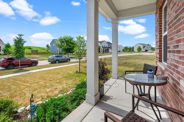 8520 White Oaks Ct, Wonder Lake, IL 60097 - porch with a lawn and a residential view