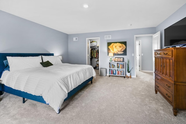 8520 White Oaks Ct, Wonder Lake, IL 60097 - bedroom with light carpet and a walk in closet